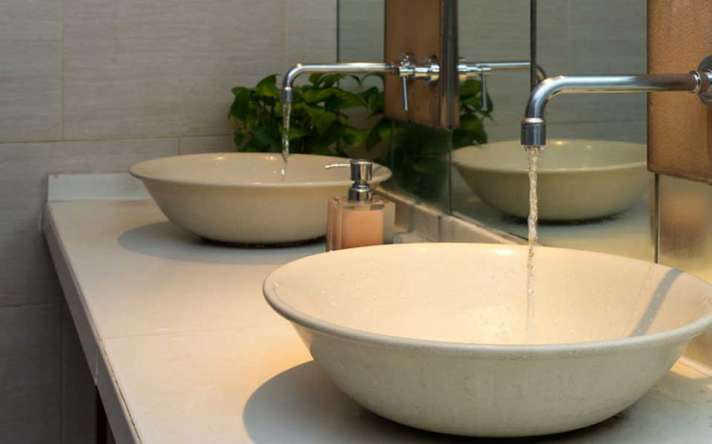 Two Bathroom Sinks with Faucets