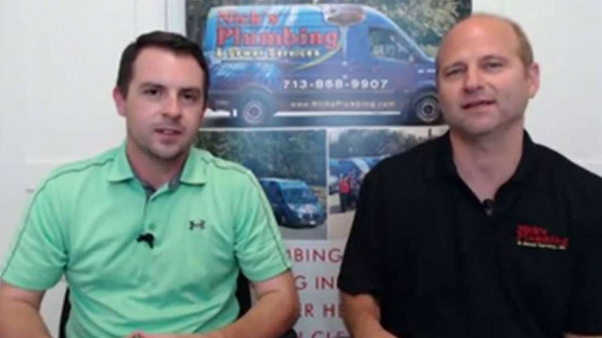 Two of Nick's Plumbing Experts in Houston Talking and Smiling