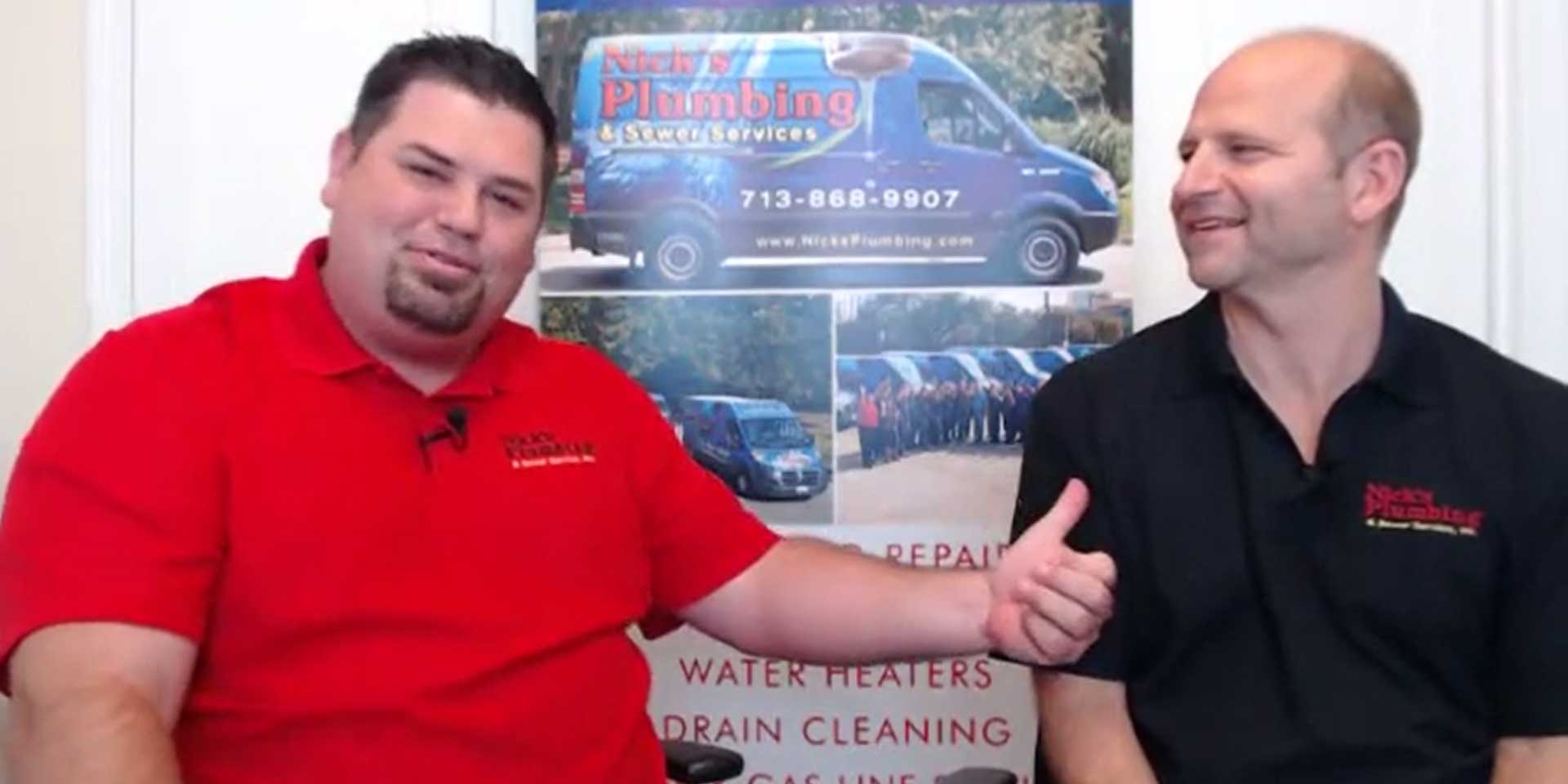 Two of Nick's Plumbing Experts in Houston Talking and Laughing