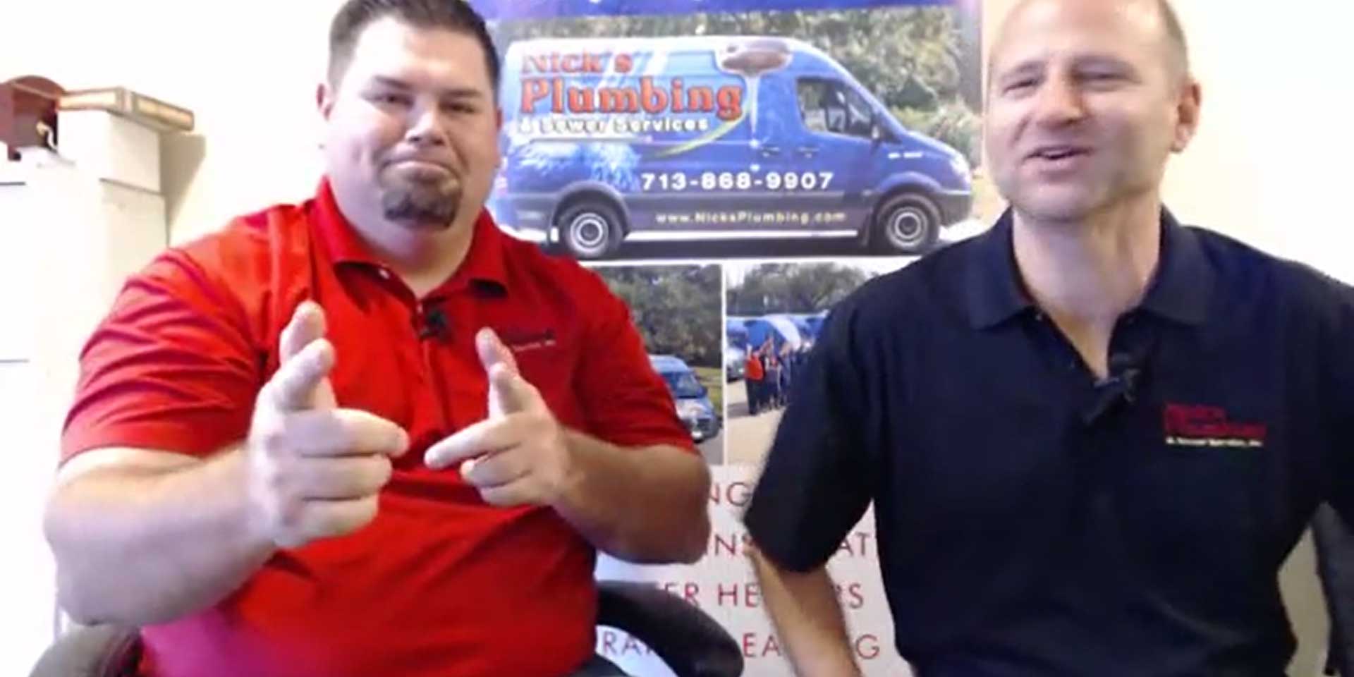 Two of Nick's Plumbing Experts in Houston Talking and Laughing