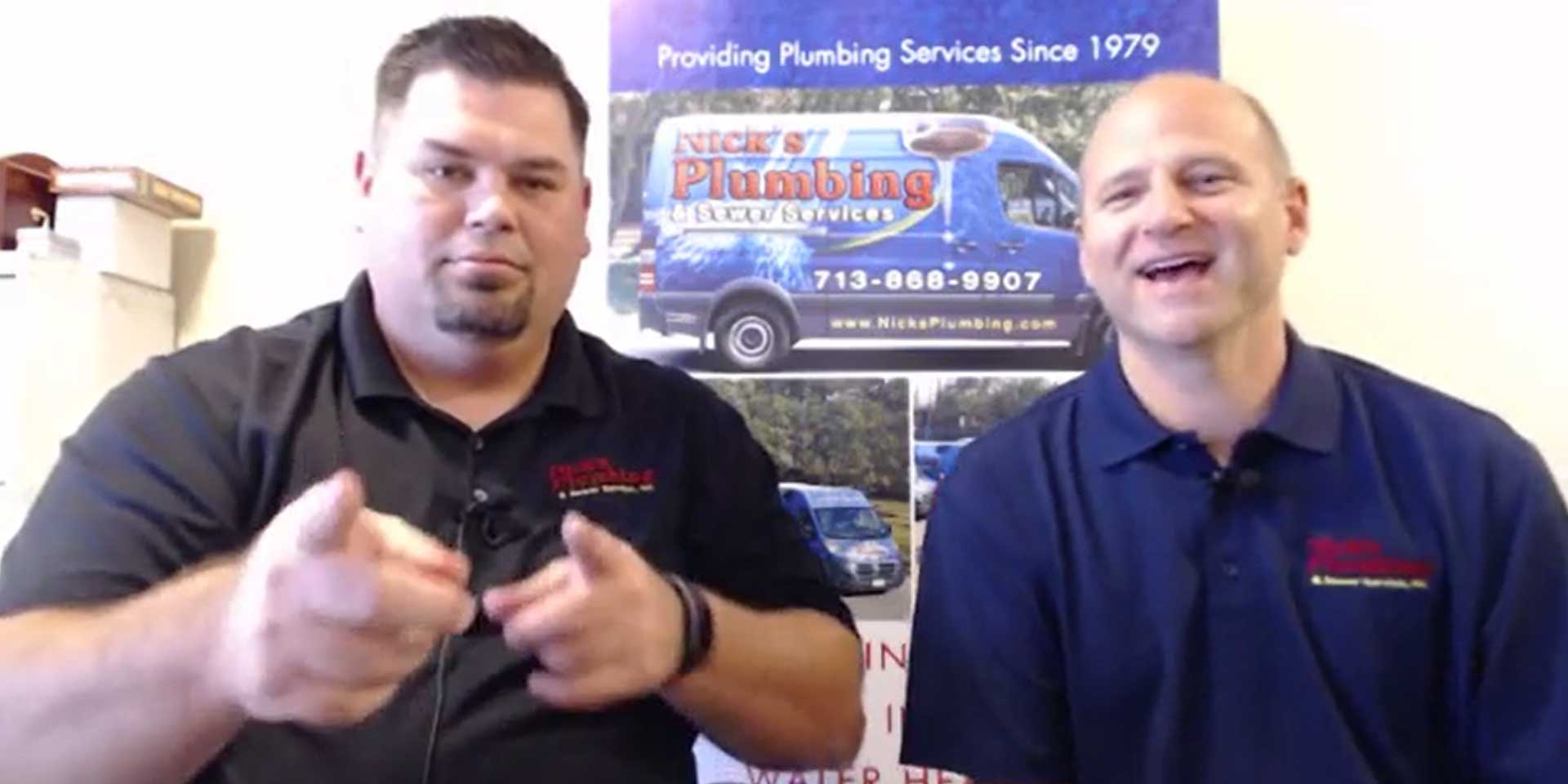 Two of Nick's Plumbing Experts in Houston Talking and Laughing