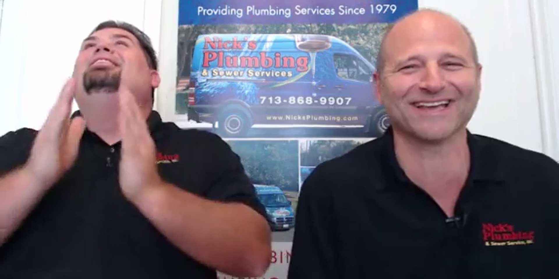 Two of Nick's Plumbing Experts in Houston Talking and Laughing