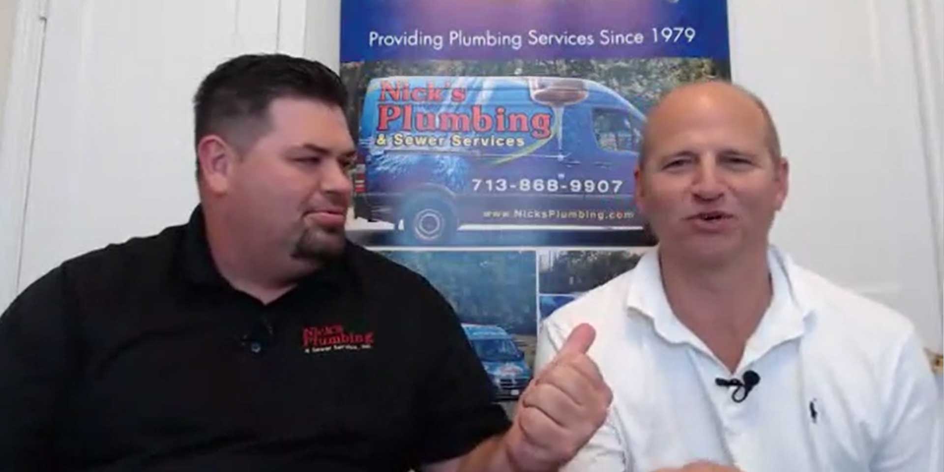 Two of Nick's Plumbing Experts in Houston Talking and Smiling