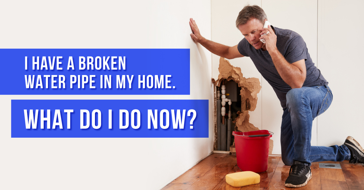 Man Calling a Plumber after Finding a Broken Pipe in the Wall