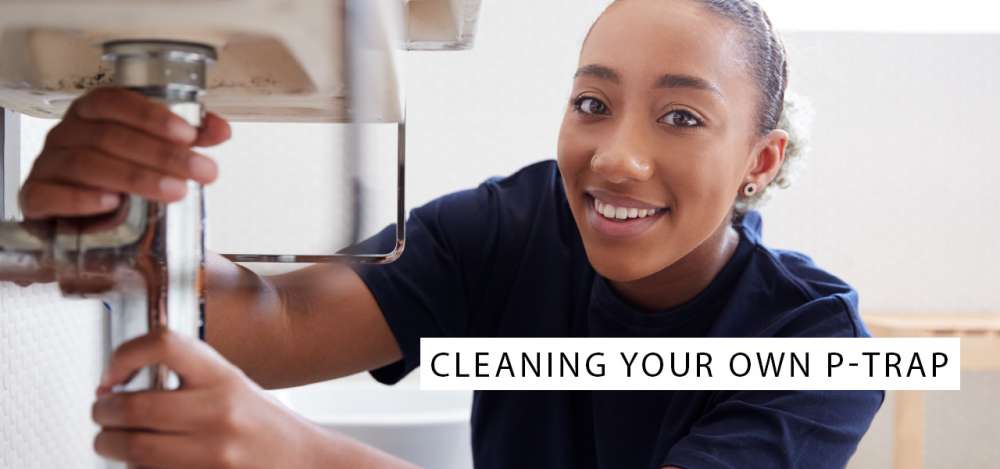 woman cleaning the p-trap at home