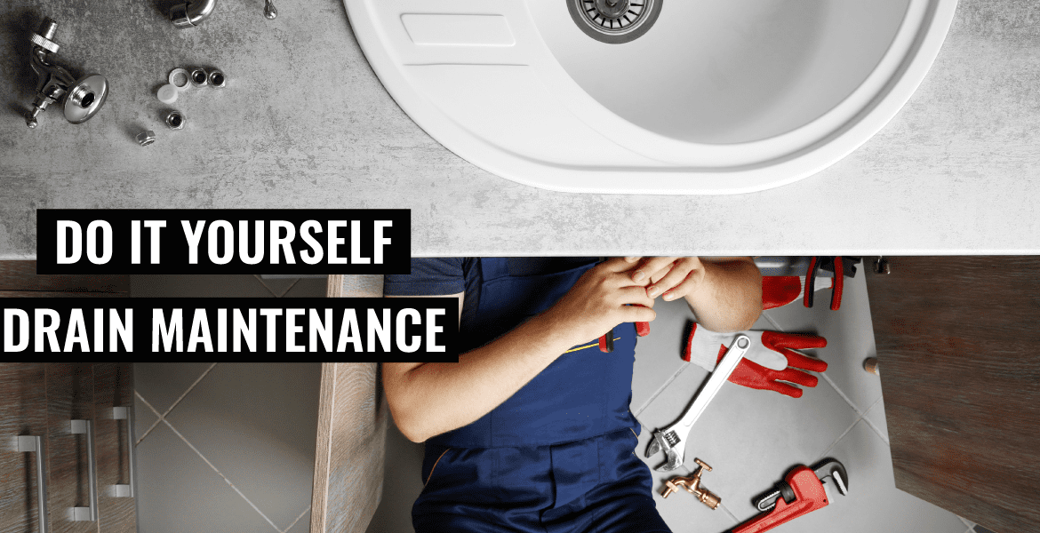 man repairing the sink
