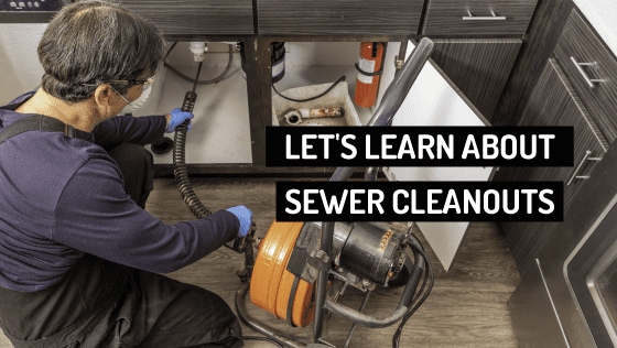 Licensed Plumber Performing a Sewer Cleanout in a Houston Home